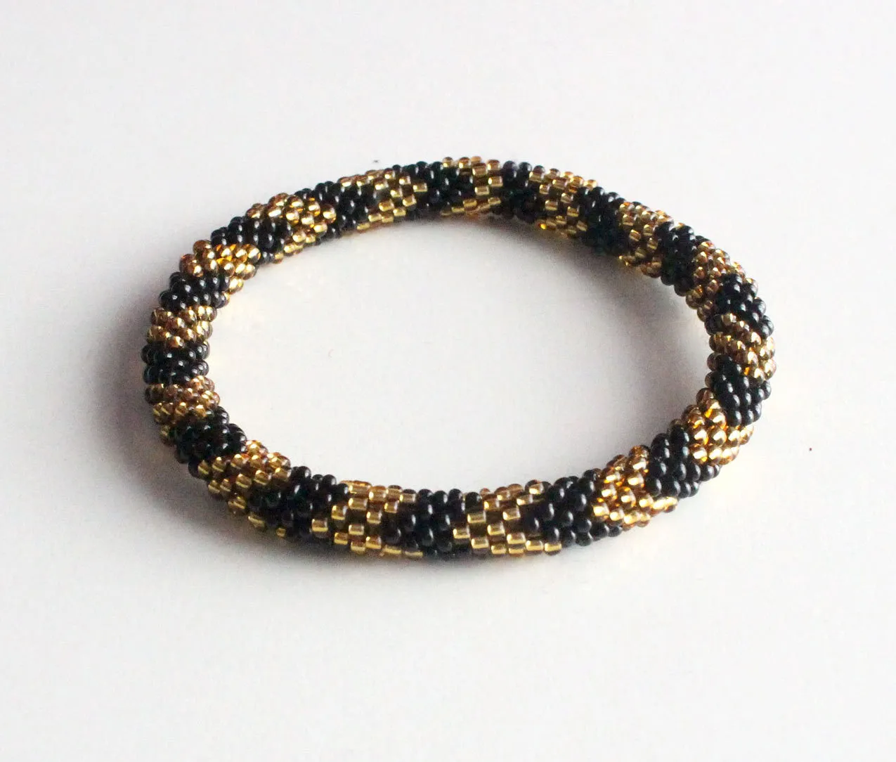 Gold and Black Beads Roll On Bracelet